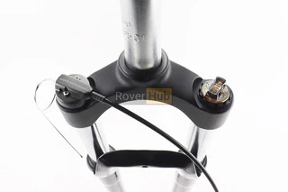 Вилка 29" амортизаційна, без різьби 1-1/8" (28,6мм), шток 255мм, з ходом 100мм, Disk-brake, пружинно-оливна, виносний Lockout,